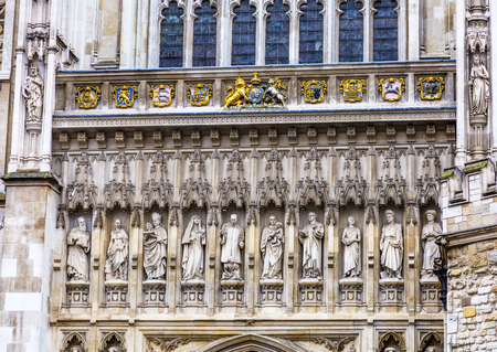 Christian Martyr Statues Above Door Facade Westminster Abbey Church London England.  Statues include Martin Luther King/USA and Wang Zhiming/China.  Decidcated June 9, 1998.の写真素材