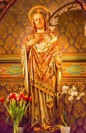 Jesus Christ Sacred Heart Wooden Figure De Krijtberg Church Amsterdam Holland Netherlands. De Krijtberg may be the most beautiful church in Amsterdam.のeditorial素材