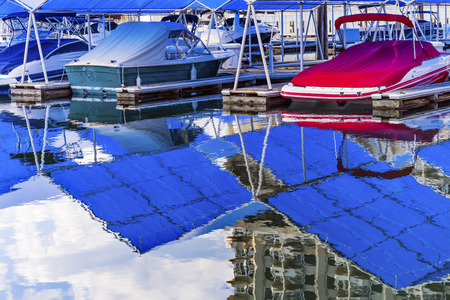 Blue Covers Boardwalk Marina Piers Boats Reflection Lake Coeur d' Alene Idahoの写真素材