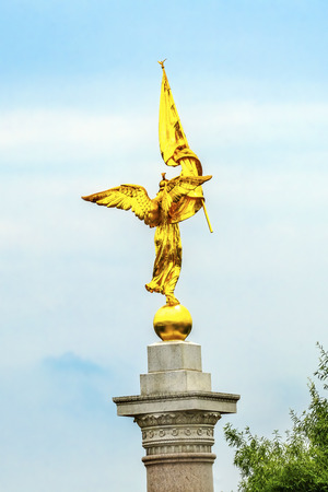 Golden Winged Victory Statue First Division Army World War 1 Memorial President's Park Washington DC.  Created 1924 Sculptor Daniel French Smith right next to Old Executive Office Building and White Houseの写真素材