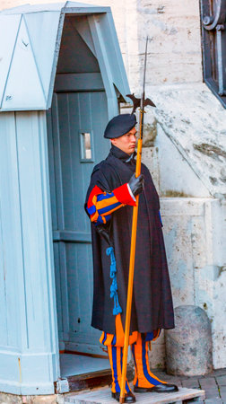 Colorful Swiss Guard Saint Peter's Basilica Vatican Rome Italy.  De Facto Military of the Vatican with the responsibility of protecting the Pope since the 1400sのeditorial素材