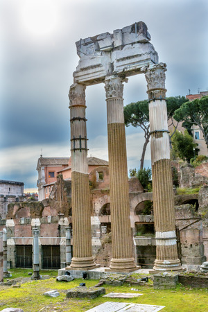 Temple of Vespasian and Titus Corinthian Columns Roman Forum Rome Italy.  Temple created in 79 AD by Emperor Titus, finished by Emperor Vespacianの写真素材