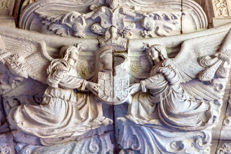 Stone Angels West Portal Monastery Saint Jerome Mosteiro dos Jeronnimos Belem Lisbon Portugal. Catholic Monastery of Saint Jerome in 1501. Sculptures created in 1517.のeditorial素材