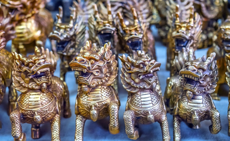 Chinese Replica Bronze Dragons Panjuan Flea Market  Decorations Beijing China.  Panjuan Flea Curio market has many fakes, replicas and copies of older Chinese products, many ancient.の写真素材