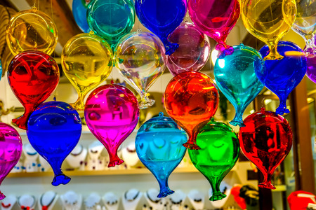 Colorful Red Blue Yellow Green Venetian Glass Venice Italy Venice is famous for its glass.の写真素材