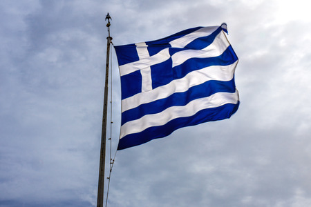 Blue White Greek Flag Summit Acropolis Athens Greece. Cross symbolizes Greek Orthordox Chritiianity,...