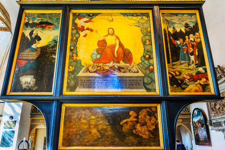 Cranach Christ Altarpiece Painting Saint Mary's City Church Stadtkirche Lutherstadt Wittenberg Germany. Martin Luther's church. Founded in 1187. Cranach Elder Installed Altarpiece 1547.のeditorial素材