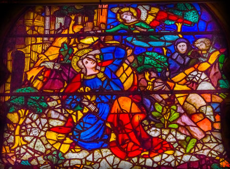 Annuciation Mary Angel Gabriel Stained Glass Window Orsanmichele Church Florence Italy. Church and stained glass from 1400s. Angel tells Mary about Jesus.のeditorial素材