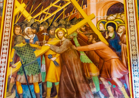 Jesus Christ Cross Medieval Renaissance Fresco Collegiate Church of Santa Maria Assunta San Gimignano Tuscany Italyのeditorial素材