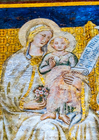 Madonna and Child BFresco by Taddeo di Bartolo Outside San Gimignano Italy Fresco done in the early 1500s.のeditorial素材