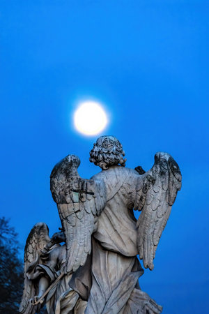 Moon Bernini Angel Castel Ponte Sant Angelo Rome Italy. Gian Lorenzo Bernini famous Italian sculptor in 1600s.のeditorial素材