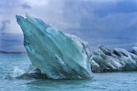 Blue Large Iceberg Diamond Beach Jokulsarlon Glacier Lagoon Vatnajokull National Park Iceland.  Ice...