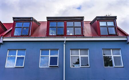 Red Blue Colorful Corrugated Iron Metal House  Street Reykjavik Iceland.  Corrugated Metal used...