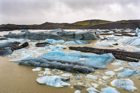 Blue Large  Svinafellsjokull Glacier Brown Lagoon Vatnajokull National Park Iceland.の写真素材