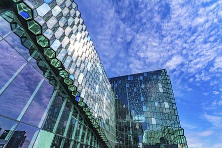 Modern Glass Concert Hall Reykjavik Iceland. Constructed in 2011 of Modern Geometric Shaped Glass Panelsの写真素材