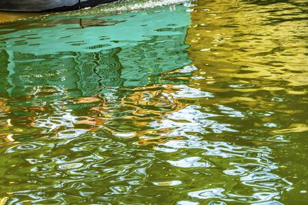 Boat Reflection Abstract Background River Walk San Antonio Texas. 15 Mile River Walk created in the 1960s to deal with flood problem.の写真素材