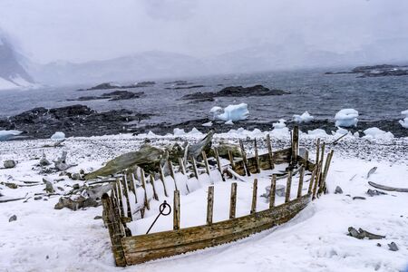 Snowing Whaling Boat Camp Snow Mountains Antarctic Peninsula Antarctica.