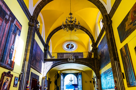 Basilica Door Yellow Church of San Cristobal  Puebla Mexico. Church built in 1687.のeditorial素材