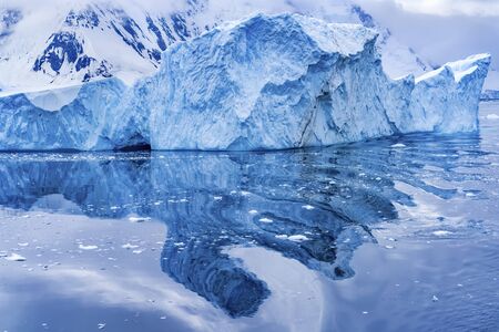 Iceberg Snow Mountains Blue Glaciers Reflection Abstract Dorian Bay Antarctic Peninsula Antarctica. ...