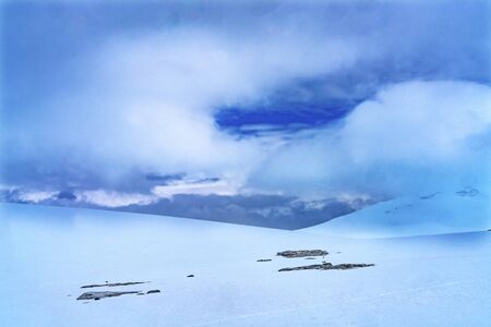 Snow Mountains Blue Glaciers Damoy Point Antarctic Peninsula Antarctica.  Glacier ice blue because...