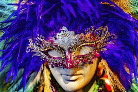 Colorful Red Mask Blue Feathers New Orleans Louisiana.  Masks worn at Mardi Gras. の写真素材