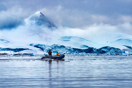 Rubbert Boat Tourists Blue Glacier Snow Mountains Paradise Bay Skintorp Cove Antarctica.