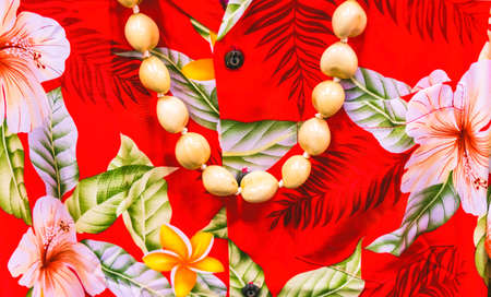 Colorful Hawaiian Orange Hibiscus Yellow Plumeria Red Shirt Polynessian Textiles Cloth Handicrafts Maui Hawaiiの写真素材