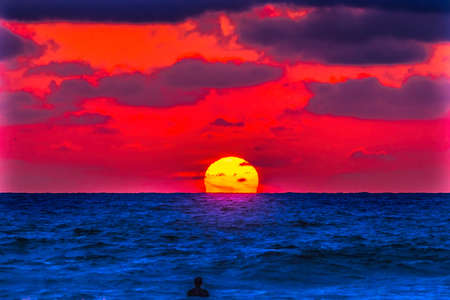 Surfer Watching Sunset La Jolla Shores Beach San Diego Californiaの写真素材