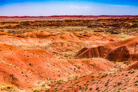 Orange Red Hills Green Plants Tiponi  Point Painted Desert Petrified Forest National Park Arizonaの写真素材