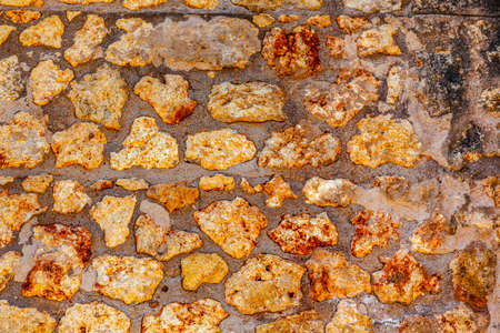 Ancient Stone Wall Ruins Italica Roman City Just Outside Seville Andalusia Spain. Built in 206BC, first Roman settlement in Spain and outside of Italy.の写真素材