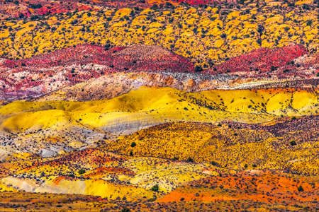 Painted Desert Colorful Abstract Yellow Grass Lands Orange Sandstone Red Fiery Furnace Arches National Park Moab Utah USA Southwest.の写真素材