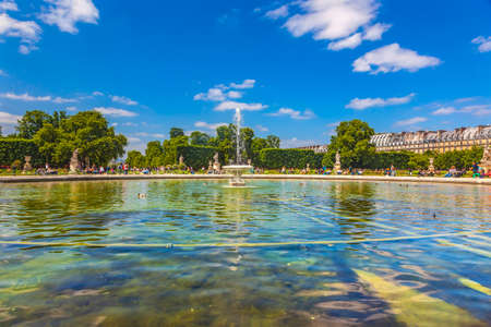 Fountain Big Blue Lake Tourists Statues Tuileries Garden Paris Franceの写真素材