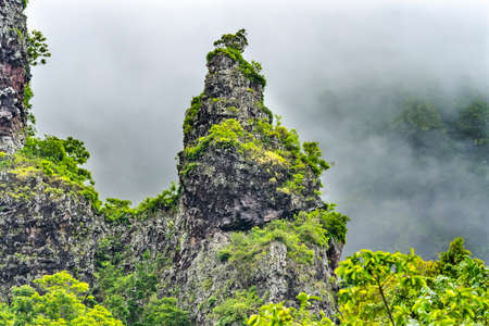 Colorful Mount Mouapu Clouds Shark's Teeth Mountains Volanic Peaks Moorea Tahiti French Polynesia.  Picture from Belvedere Lookoutの写真素材