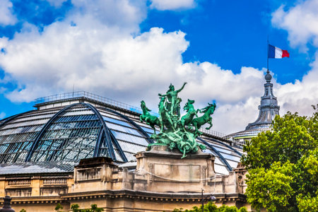 Glass and Steel Grand Palais de Champs Elysees Palace Statue Flag Paris France Large exhibition hall and museum center. Built in late 1800s for Universal Exposition in 1900のeditorial素材