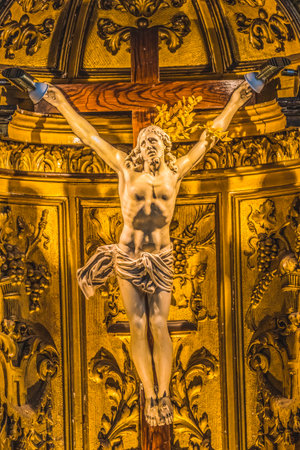 Jesus Statue Crucifix Cross Altar Basilica Old Wooden Saint Catherine Church Honfluer Normandy France.  Built in 1400s one of the oldest wooden churches in Europeのeditorial素材