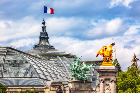 Glass and Steel Grand Palais de Champs Elysees Palace Statues Flag Paris France Large exhibition hall and museum center. Built in late 1800s for Universal Exposition in 1900のeditorial素材