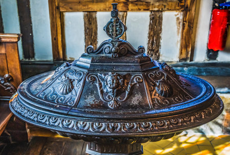 Baptism Font Basilica Old Wooden Saint Catherine Church Honfluer Normandy France. Bronze furniture used to baptise children,  Built in 1400s one of the oldest wooden churches in Europeのeditorial素材