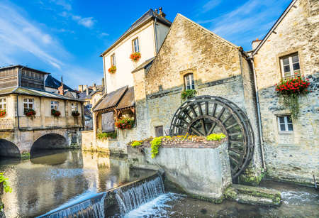 Colorful Old Buildings Mill, Aure River Reflection Bayeux Center Normandy France.Bayeux founded 1st century BC, first city liberated after D-Dayの写真素材