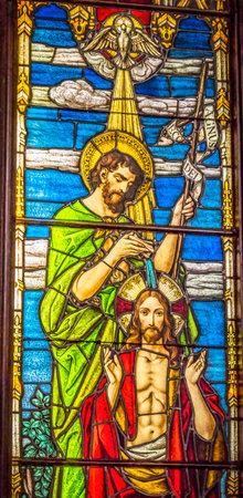 Baptism Jesus Christ John the Baptist Stained Glass Trinity Episcopal Parish Church Saint Augustine Florida.  Founded in the 1700s. Stained glass from mid-1800sのeditorial素材