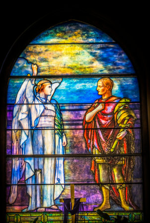 White Angel Saint Trinity Episcopal Parish Church Saint Augustine Florida.  Founded in the 1700s. The stained glass is from the mid-1800sのeditorial素材