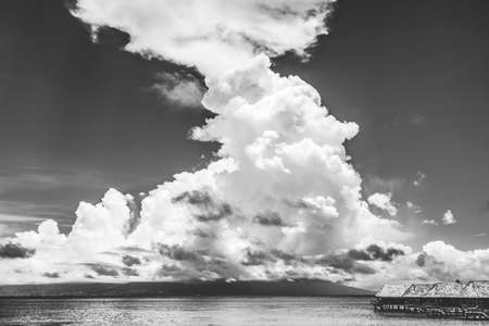 Pier High Rain Storm Coming Thunderhead Cloudscape Flag Tahiti Island Distance Water Moorea Tahiti French Polynesia.の写真素材