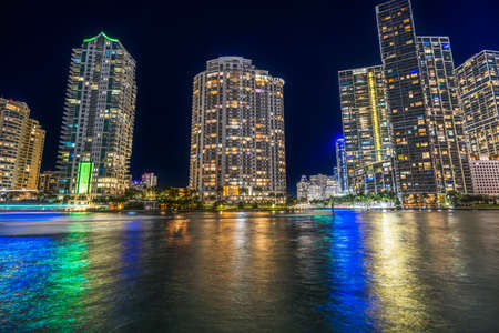 Colorful Miami River Water Reflections Night Stars Apartment Buildings Downtown Riverwalk Miami Floridaのeditorial素材