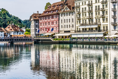 Colorful Buildings Restaurants Shops Bridges Tourists Inner Harbor Reuss River Reflection Lucerne Switzerlandの写真素材