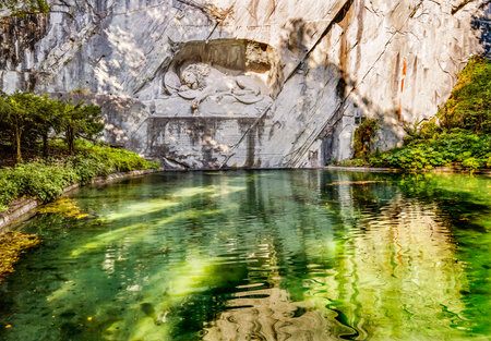 Dying Lion Rock Reflief Reflection Cliff Lucerne Switzerland Created in 1821 by Bertel Thorvaldsen. Monument Swiss guards killed in 1792 protecting king French Revolutionの写真素材