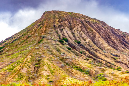Colorful Koko Crater Extinct Volcano Honolulu Oahu Hawaii Hiking trail over railroad tracks to...