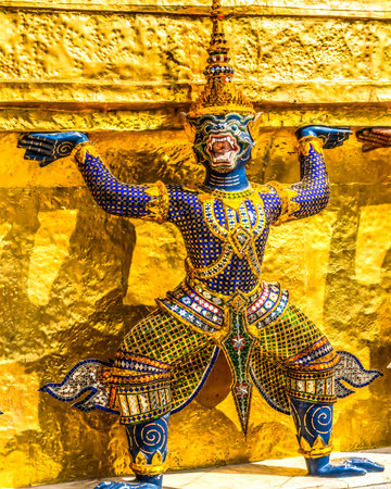 Colorful Guardian Statue Gold Stupa Pagoda Grand Palace Bangkok Thailand Palace was a complex of...
