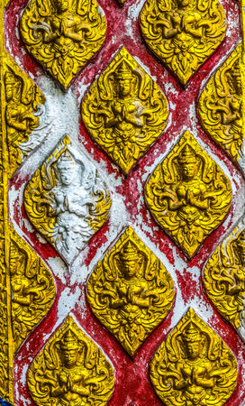 Colorful Buddha Decorations Wat That Sanarun Sunthikaram Community Temple Bangkok Thailand. Small old Temple in a neighborhood in Bangkok.の写真素材