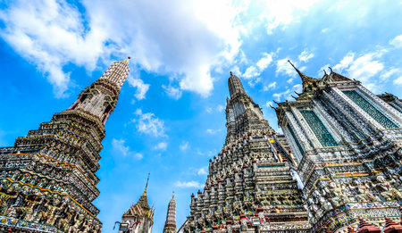 Coloful Central Prangs Temple Complex Wat Arun Buddhist Temple of Dawn Complex Bangkok Thailand....