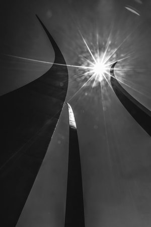 Black and White Sun Air Force Memorial Arlington Virginia. Next to the Pentagon. Dedicated 2006. Three Stainled Steel Spires resemble the vapor trails of the Air Force Thunderbirds during a maneuver.の写真素材