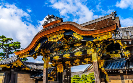 Coloful Ornate Entrance Karamon Gate Nijo Castle Kyoto Japan. Completed in 1626 by Tokugawa Shoguns. In 1867 Castle returned to Emperor. Chrysanthemum is a symbol of Imperial Court.の写真素材